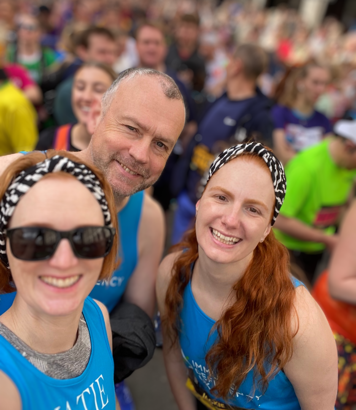 smiling runners after completing half marathon